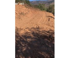 PARCELA RUSTICA 1101 MT CON SUPERFICIE PLANA CAMINO ASFALTADO
