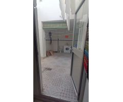 PISO BAJO 125 m2 CON DOS PATIOS